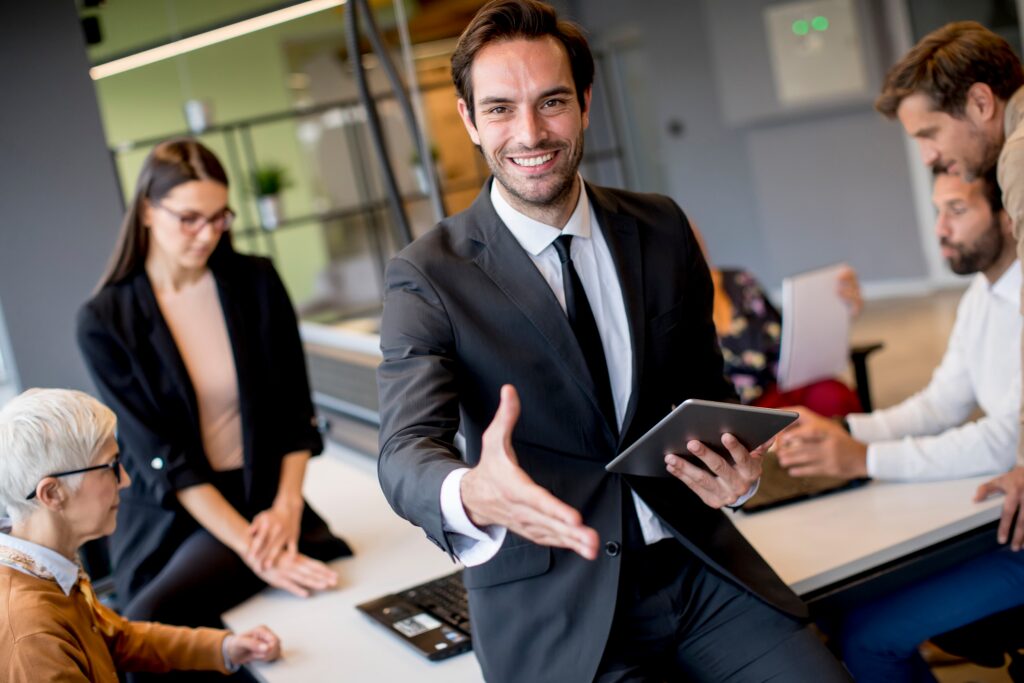A confident professional demonstrates how to get a sales job through strong communication and presence.