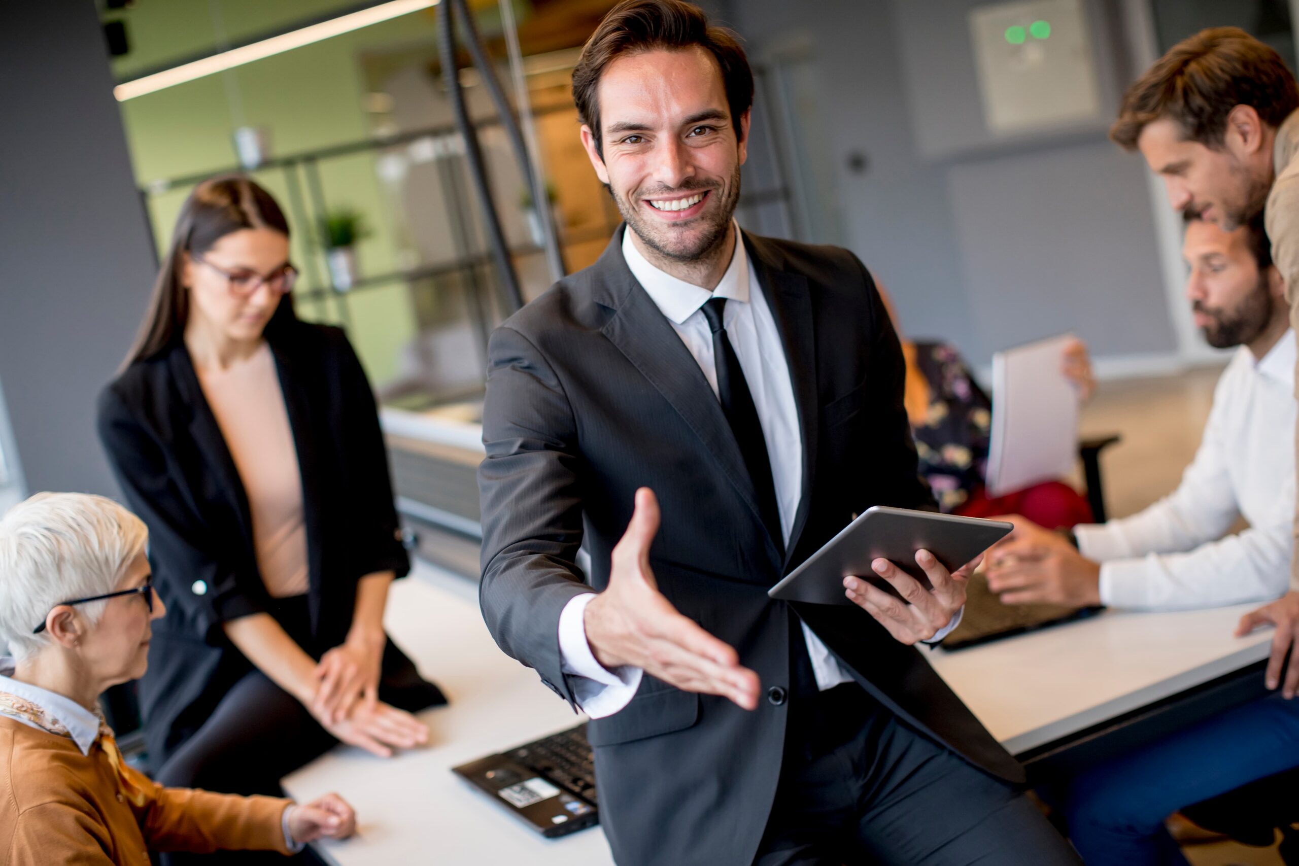 A confident professional demonstrates how to get a sales job through strong communication and presence.